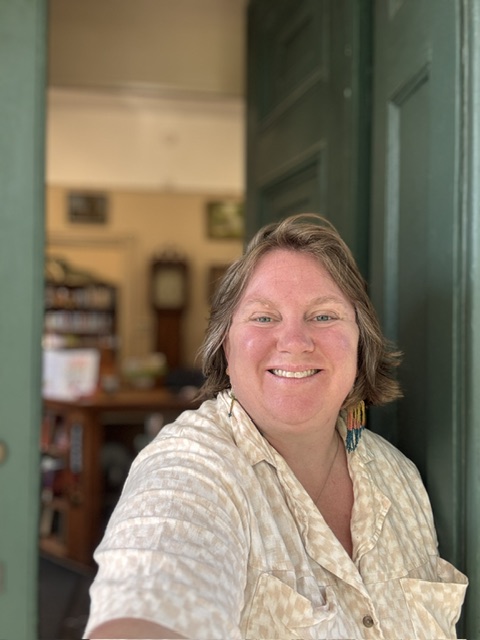 Frances in front of the library door